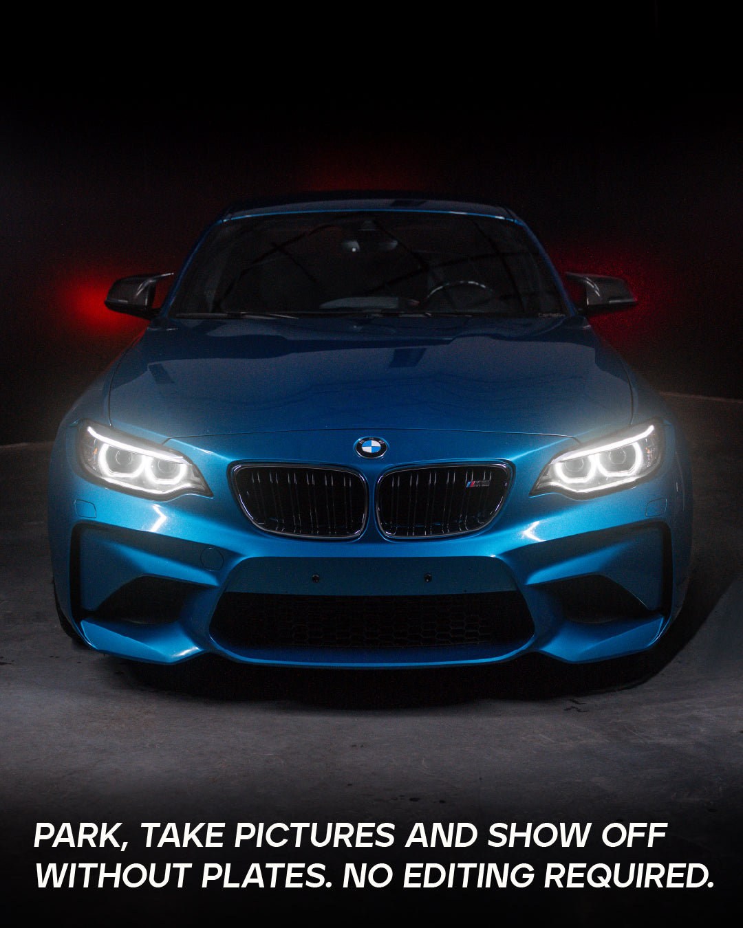 Blue BMW M2 with clean front bumper and no license plate – plate-free look enabled by QuickPlate